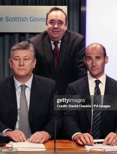 Celtic chief executive Peter Lawwell Rangers chief executive Martin Bain and First Minister Alex Salmond during the Scottish Football Summit in St...