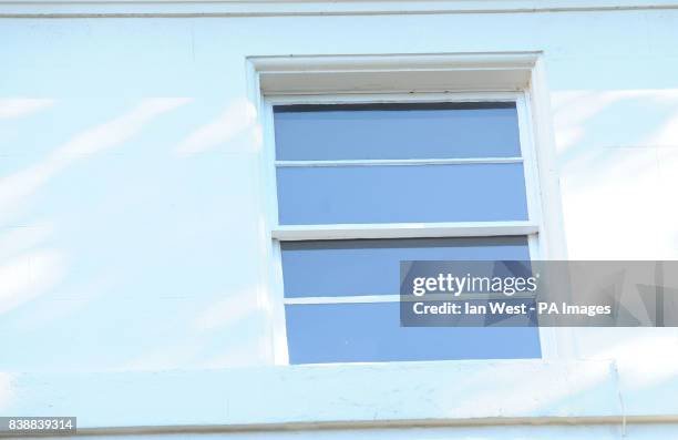 The third floor window in Kensington, west London where the sister of chart star Mika, Paloma Penniman, fell from and was impaled onto railings below.