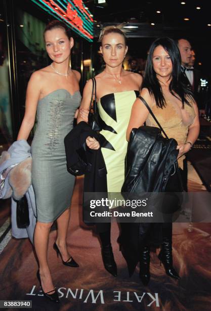 From left to right, Kate Moss, Meg Mathews and Fran Cutler attend the London premiere of 'Titanic' at the Empire Leicester Square, 18th November 1997.