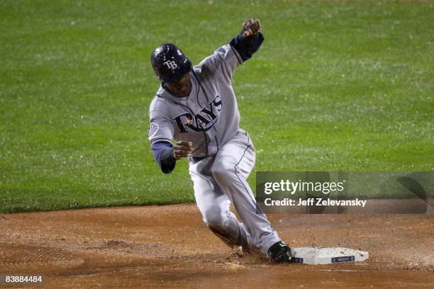 Upton of the Tampa Bay Rays slides into second base in the top of the sixth inning against the Philadelphia Phillies during game five of the 2008 MLB...