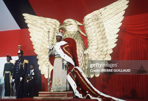 Self-proclaimed emperor of Centrafrican empire, Jean-Bedel Bokassa stands 04 December 1977 on his throne after crowning himself in Bangui, following...