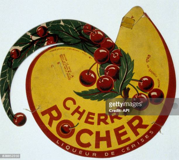 Affiche publicitaire pour la marque de liqueur de cerises 'Cherry Rocher', en France.