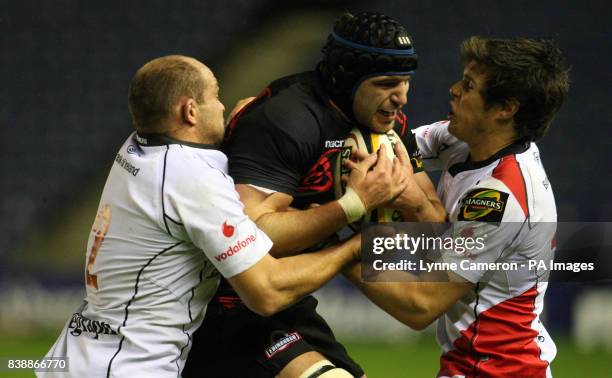 Einburgh's Fraser McKenzie is challenged by Ulster's Rory Best and Adam D'Arcy during the Magners League match at Murrayfield Stadium, Edinburgh.