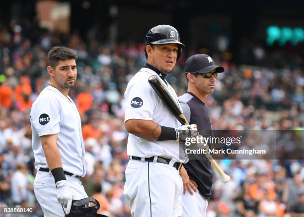 Nicholas Castellanos, Miguel Cabrera and manager Brad Ausmus of the Detroit Tigers look on during the game against the New York Yankees at Comerica...