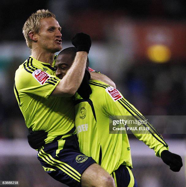 Derby County's Scottish midfielder Gary Teale celebrates with goal-scorer English forward Nathan Ellington after he scored against Stoke City during...