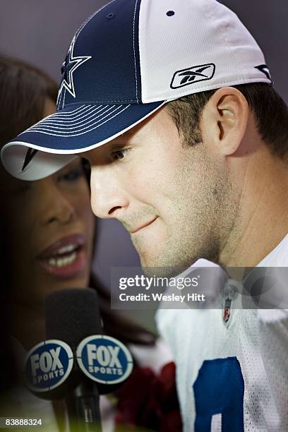 Tony Romo of the Dallas Cowboys is interviewed by FOX Sports after a game against the Seattle Seahawks at Texas Stadium on November 27, 2008 in...