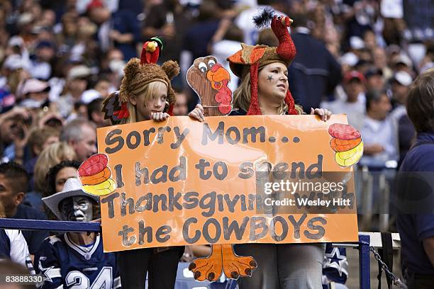 Fans of the Dallas Cowboys send a message home at Thanksgiving during a game against the Seattle Seahawks at Texas Stadium on November 27, 2008 in...