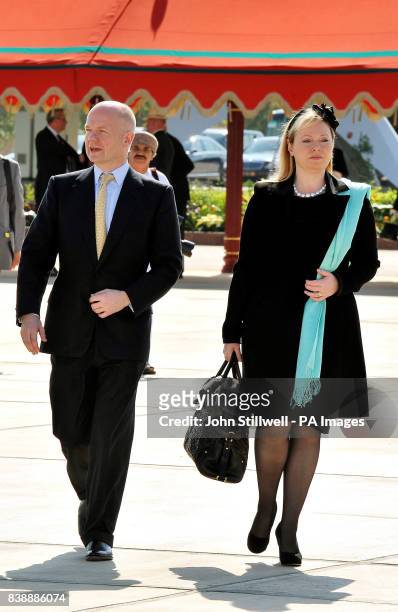 Foreign Secretary William Hague and his wife Ffion walk towards the Royal flight plane, to depart Muscat Airport for home, after they accompanied...