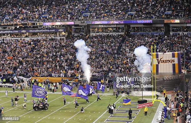 General view as pyrotechnics explode as part of the Minnesota Vikings team entrance prior to an NFL game against the Chicago Bears at the Hubert H....
