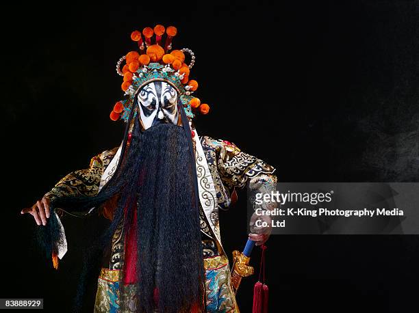 chinese opera character with sword (ba wang) - peking opera stock pictures, royalty-free photos & images