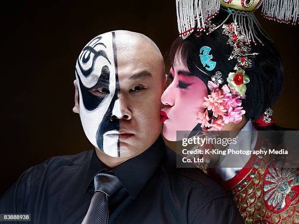 female chinese opera singer kissing male actor - opera singer stock pictures, royalty-free photos & images