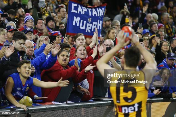 Luke Hodge of the Hawks thanks Bulldogs fans after his retirement during round 23 AFL match between the Hawthorn Hawks and the Western Bulldogs at...