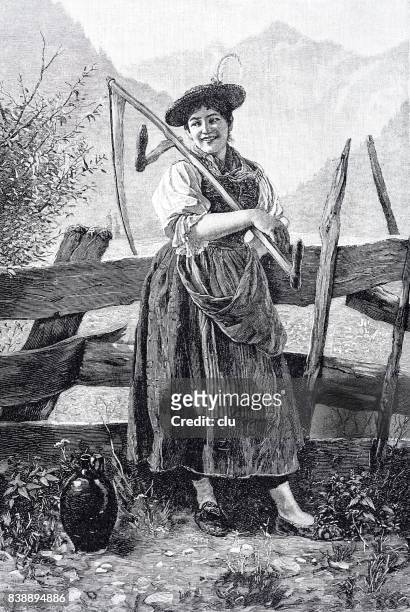 farmers wife stands on the fence with a scythe over her shoulder - farmer wife stock illustrations