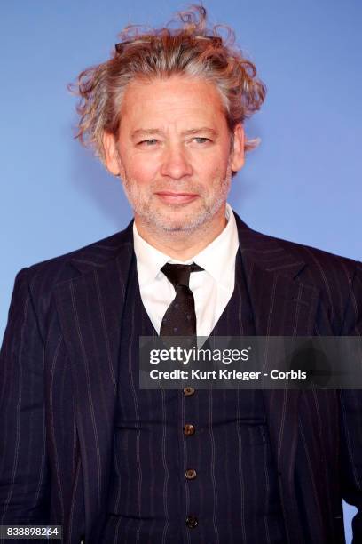 Image has been digitally retouched.) Dexter Fletcher attends the 'Eddie the Eagle' premiere in Munich, Germany on March 20, 2016.