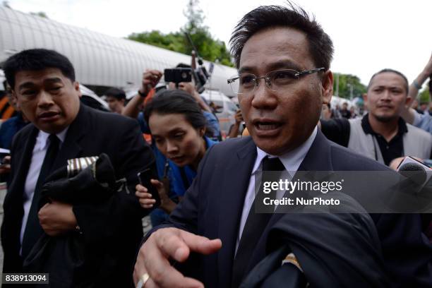 Former Prime Minister Yingluck Shinawatra's lawyer Norrawit Larlaeng denies knowledge of her whereabouts outside the Supreme Court in Bangkok,...