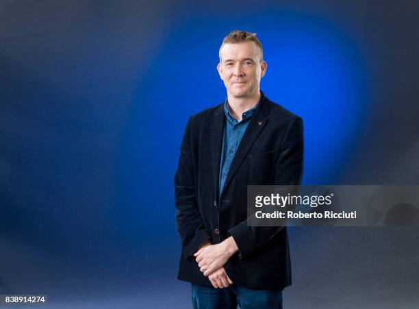 English novelist David Mitchell attends a photocall during the annual Edinburgh International Book Festival at Charlotte Square Gardens on August 25,...