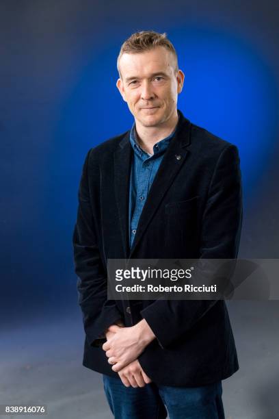 English novelist David Mitchell attends a photocall during the annual Edinburgh International Book Festival at Charlotte Square Gardens on August 25,...