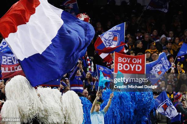 Bulldogs fans show their support during round 23 AFL match between the Hawthorn Hawks and the Western Bulldogs at Etihad Stadium on August 25, 2017...