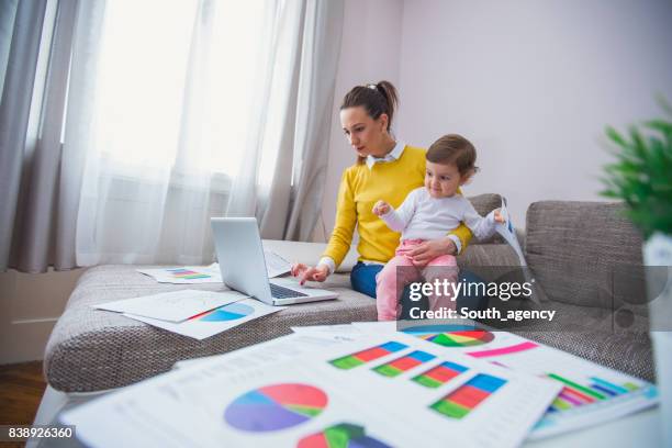 working mom - children looking graph stock pictures, royalty-free photos & images