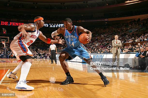 Desmond Mason of the Oklahoma City Thunder moves the ball against Quentin Richardson of the New York Knicks during the game on November 2, 2008 at...