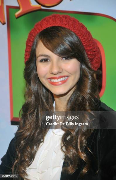 Actress Victoria Justice arrives at the world premiere of "Merry Christmas, Drake & Josh" at the Westside Pavillion on December 2, 2008 in Los...