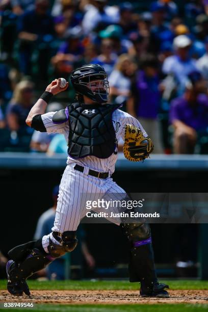 Ryan Hanigan of the Colorado Rockies in action during a game against the Milwaukee Brewers at Coors Field on August 20, 2017 in Denver, Colorado.