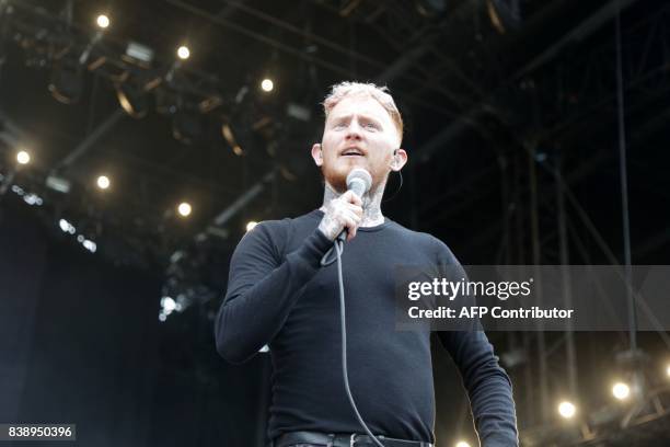 British singer Frank Carter performs on stage with his band Frank Carter & The Rattlesnakes on August 25, 2017 during the Rock en Seine music...