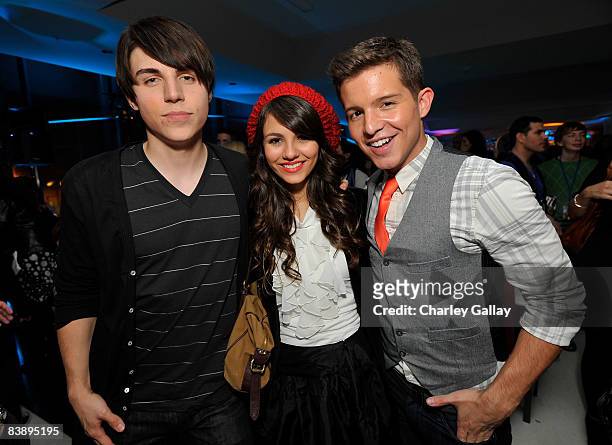 Actors Nolan Gerard Funk, Victoria Justice and Simon Curtis attend the after party for "Merry Christmas, Drake & Josh!" at the Westside Pavillion on...