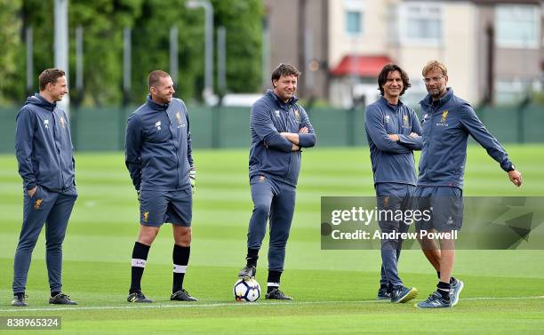 Jurgen Klopp manager of Liverpool with Zeljko Buvac, Peter Krawietz, John Achterberg, Pepijn Lijnders of Liverpool during a training session at...