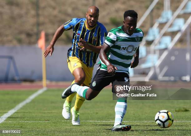 Sporting CP B forward Jovane Cabral with Real SC defender Jose Pedro from Portugal in action during the Segunda Liga match between Real SC and...