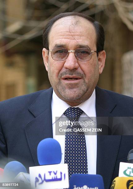 Iraqi Prime Minister Nuri al-Maliki speaks to the press following a visit to Shiite spiritual leader Grand Ayatollah Ali al-Sistani in the southern...