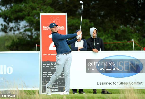 Oliver Fisher of England hits his tee shot on the 2nd hole during day two of Made in Denmark at Himmerland Golf & Spa Resort on August 25, 2017 in...