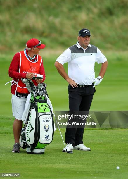 Thomas Bjorn of Denmark prepares to play his second shot on the 3rd hole during day two of Made in Denmark at Himmerland Golf & Spa Resort on August...