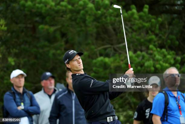 Mads Sogaard of Denmark hits his second shot on the 1st hole during day two of Made in Denmark at Himmerland Golf & Spa Resort on August 25, 2017 in...