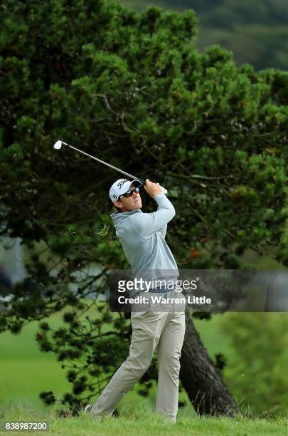 Joachim B Hansen of Denmark hits his second shot on the 1st hole during day two of Made in Denmark at Himmerland Golf & Spa Resort on August 25, 2017...