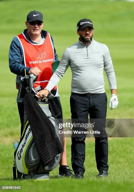 John Parry of England prepares to play his second shot on the 1st hole during day two of Made in Denmark at Himmerland Golf & Spa Resort on August...
