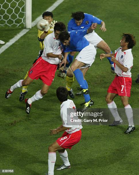 Christian Vieri of Italy scores the opening goal of the match with a header during the FIFA World Cup Finals 2002 Second Round match between South...