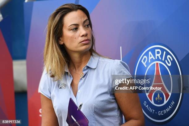 French journalist Anne-Laure Bonnet looks on prior to the French L1 football match between Paris Saint-Germain and Saint-Etienne on August 25 at the...
