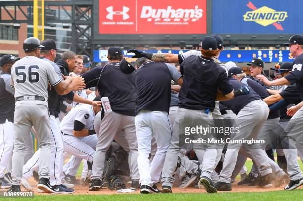 Manager Brad Ausmus of the Detroit Tigers has his hat knocked off by Gary Sanchez of the New York Yankees during a bench clearing brawl in the sixth...