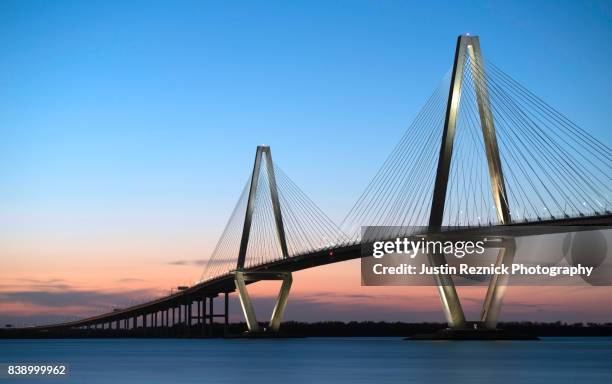 copper river bridge sunset - south carolina stock-fotos und bilder