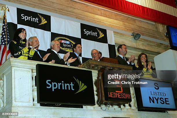 Sprint Cup Series Champion winner Jimmie Johnson , driver of the Lowe's Chevrolet, attends the opening bell with Miss Sprint Anne-Marie Rhodes, team...