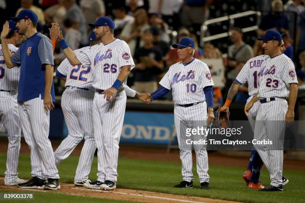 August 23: Manager Terry Collins of the New York Mets congratulates his players on their victory during the Arizona Diamondbacks Vs New York Mets...