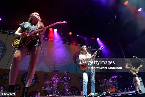 Singers Alana Haim, Danielle Haim and Este Haim of the band HAIM performs onstage at Queen Mary Events Park on August 19, 2017 in Long Beach,...