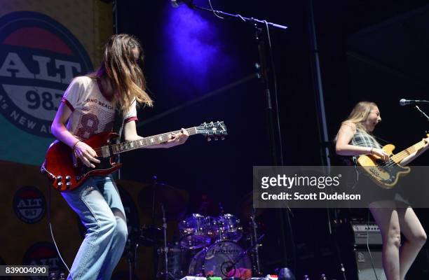 Singers Danielle Haim and Este Haim of the band HAIM performs onstage at Queen Mary Events Park on August 19, 2017 in Long Beach, California.