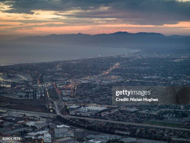 aerial flying over los angeles, ca sunset - lax airport stock pictures, royalty-free photos & images