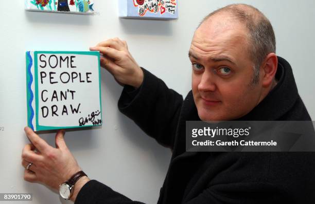 Comedian Dara O'Briain poses with his canvas at the 'Stars On Canvas' Private View at the SW1 Gallery on December 3, 2008 in London, England. The...
