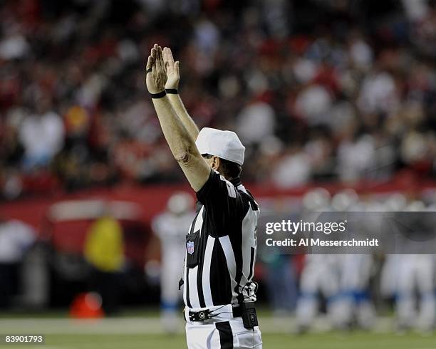 Referee Tony Corrente stretches as the Atlanta Falcons host the Carolina Panthers at the Georgia Dome on November 23, 2008 in Atlanta, Georgia.
