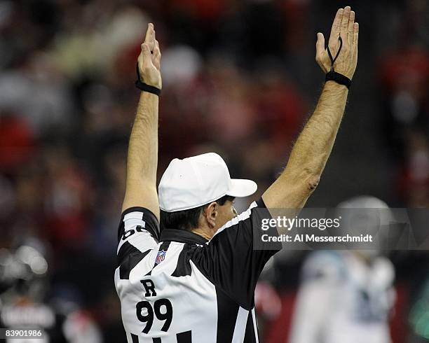 Referee Tony Corrente signals a score as the Atlanta Falcons host the Carolina Panthers at the Georgia Dome on November 23, 2008 in Atlanta, Georgia.