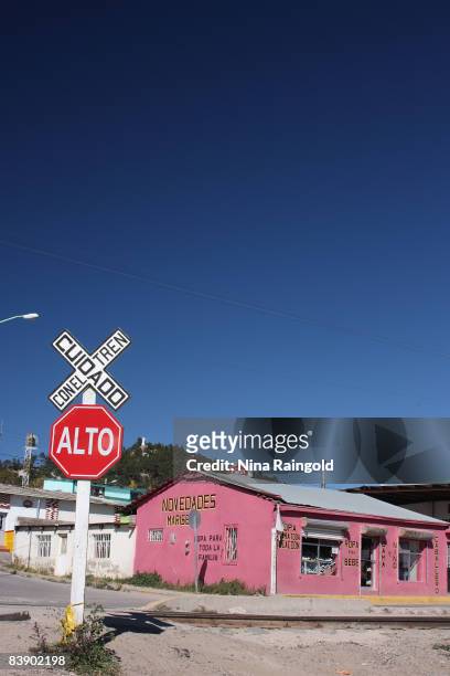 View of a railway crossing of the train line in Creel, a small farming and logging town of Creel on November 25, 2008 in Mexico. Creel is one of the...