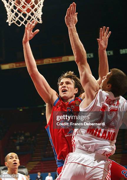 Matjaz Smodis, #8 of CSKA Moscow competes with Richard Mason Rocca, #12 of AJ Milano during the Euroleague Basketball Game 6 match between Armani...